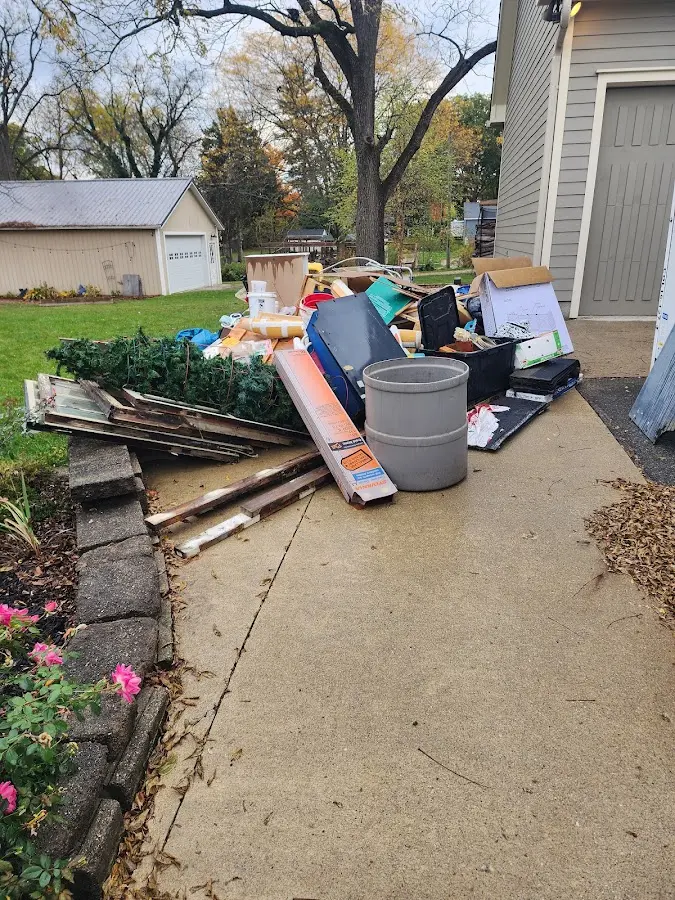 Dumpster being loaded with debris for Residential Dumpster Rental in Circleville